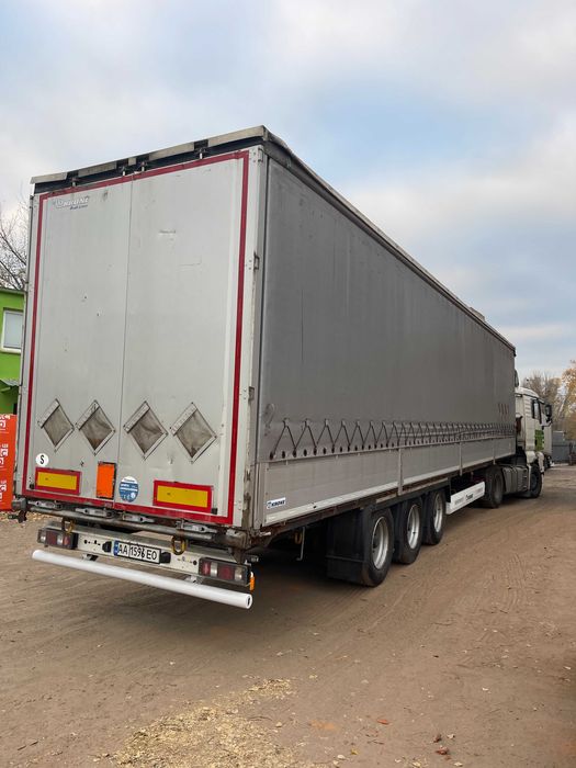 Перевезення вантажними авто, типу штора та бортова платформа