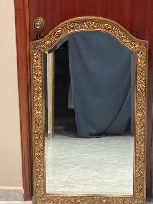 Espelho em talha dourada