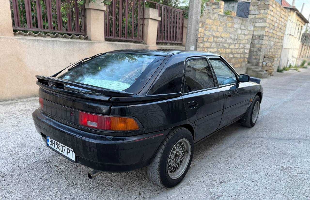 Mazda 323f слепая