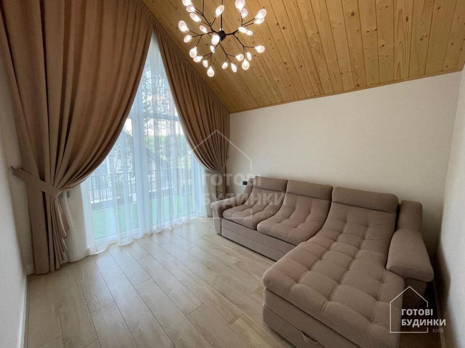 Сучасний будинок серед соснового лісу в КМ Нова Ходосівка