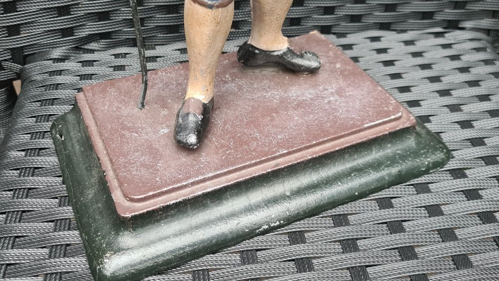 Zegar figuralny, figura sprzedawca zegarów