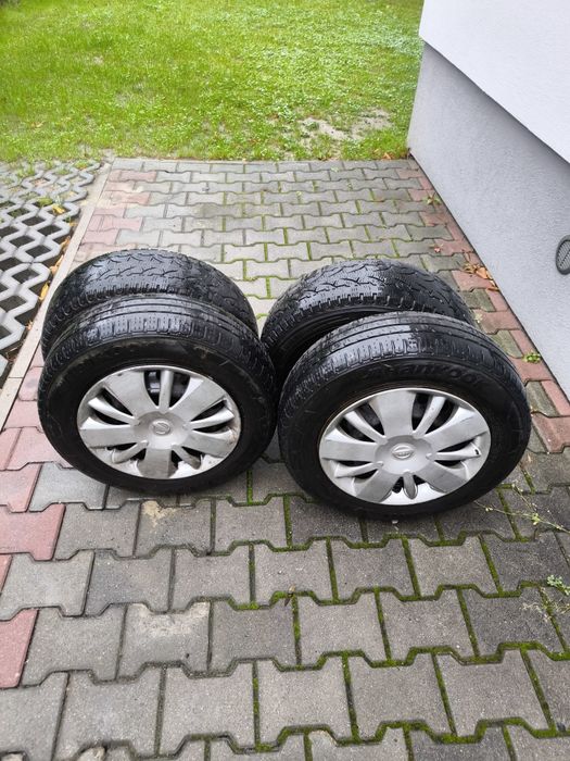 Komplet opon z felgami wielosezonowymi 175/65/14c Nissan nv200