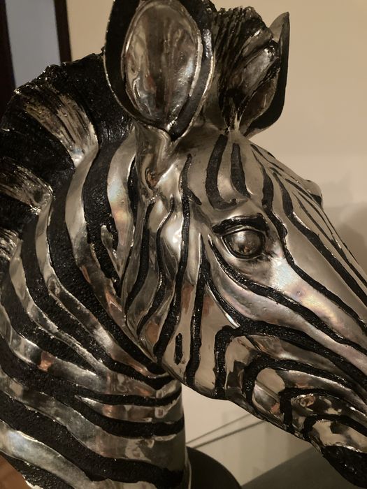 Busto de zebra como novo.