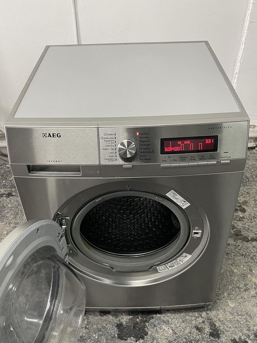 Пральна машина AEG 9 кг L87495XFL