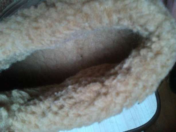 Продам теплые  удобные тапочки на натуральном меху