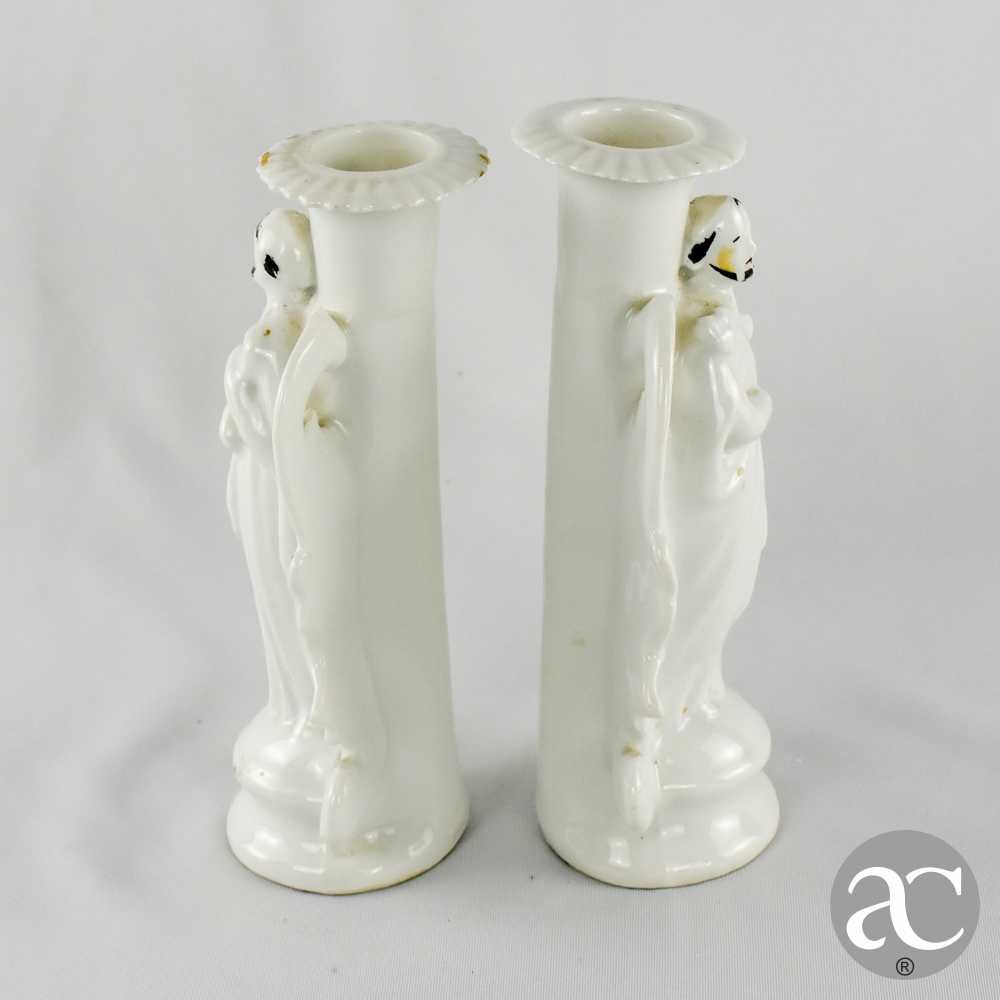 Par de castiçais em porcelana Europeia, séc. XIX