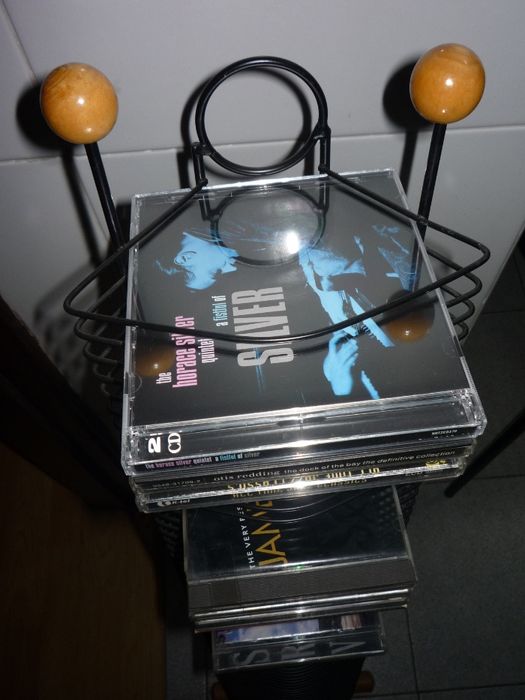 Estante para CD´s+Saco de bebé (para levar fraldas)+ mochila