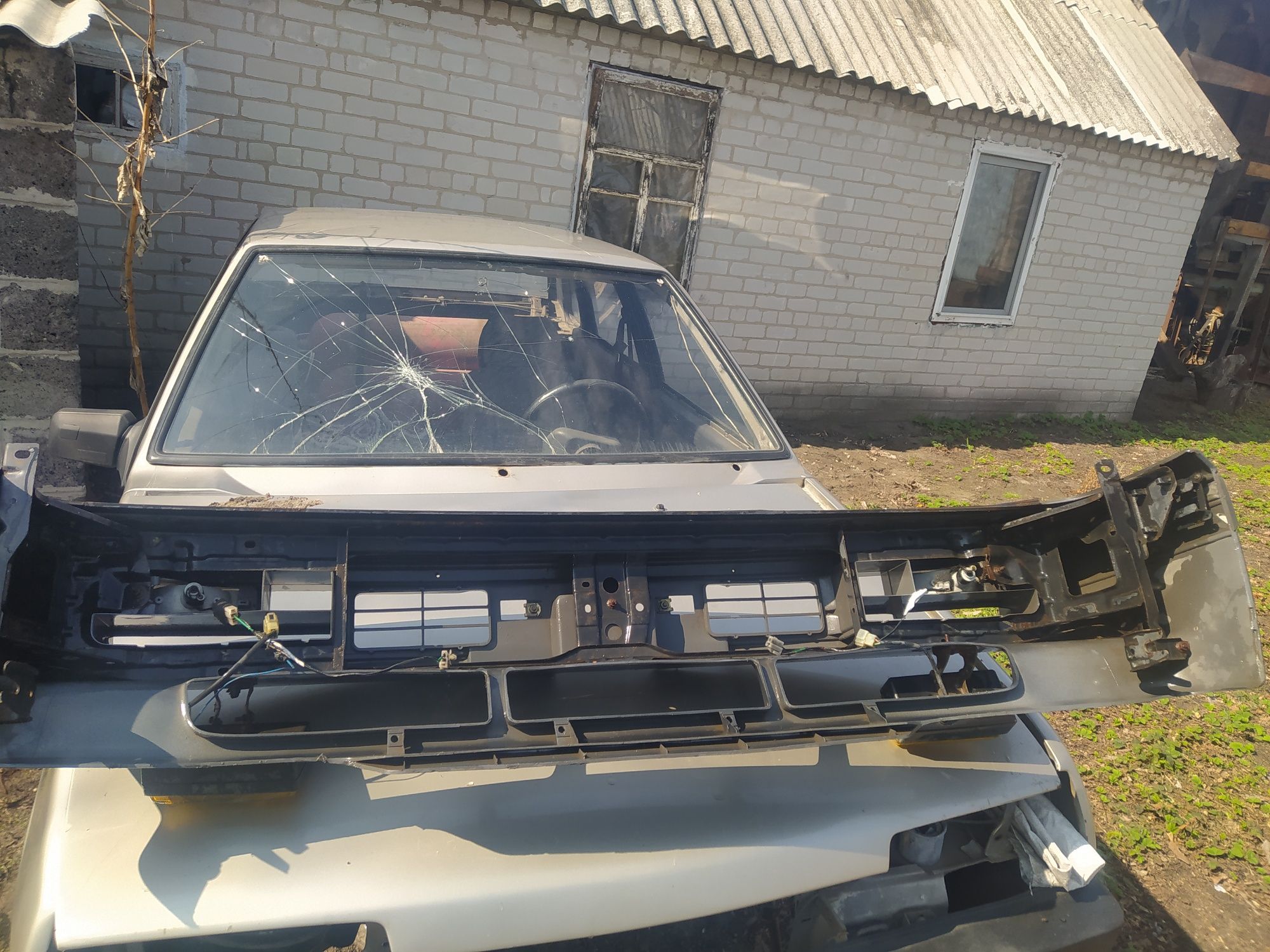 Тросик Мазда RF 2200 бампер
