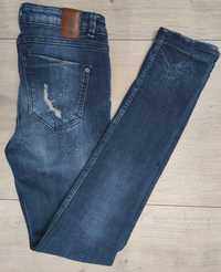 ZARA r. 34 jeansy dziury, przetarcia, plamy