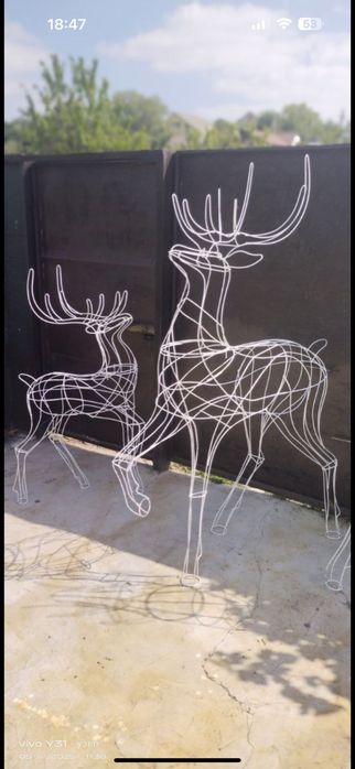 Новогодний олень новорічний олень светящійся подарунки подарки гирлян