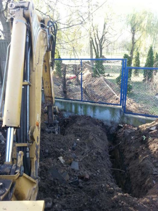 uslugi koparko-ładowarka wynajem minikoparka katowice ruda śląska cat