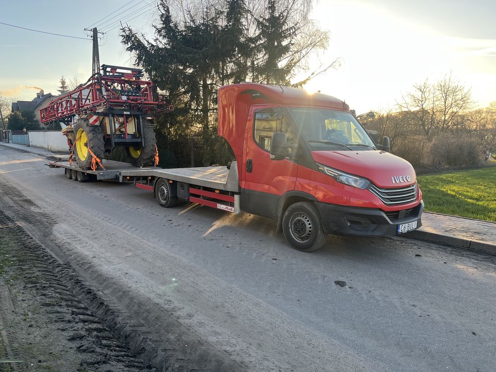 Usługi Transportowe (Pomoc Drogowa24h przewóz pojazdów oraz maszyn)