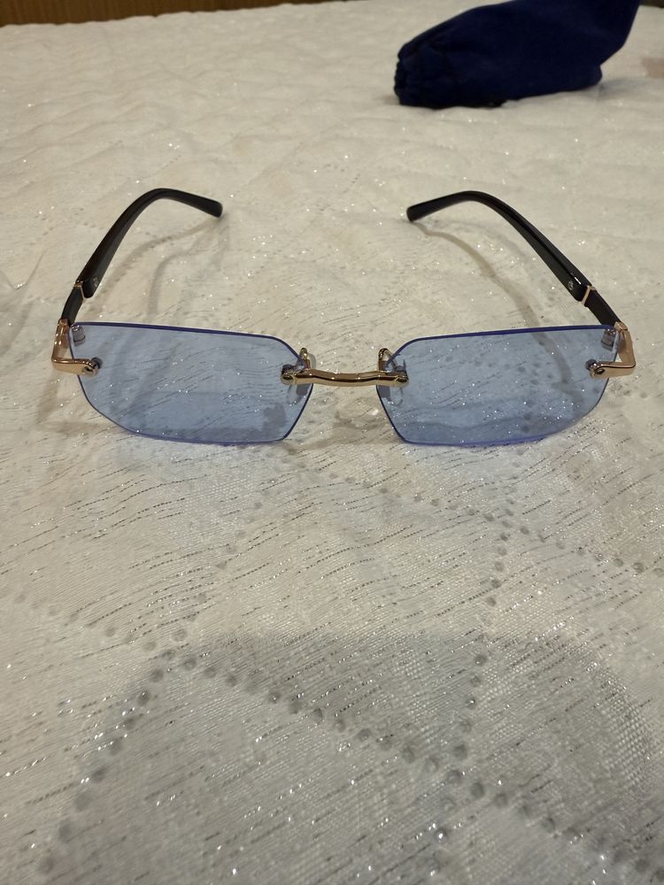 Oculos de sol.