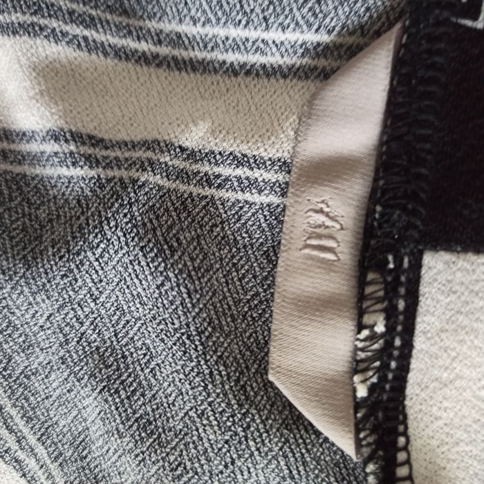 Kopertowa wzorzysta sukienka H&M elastyczna rozmiar XS