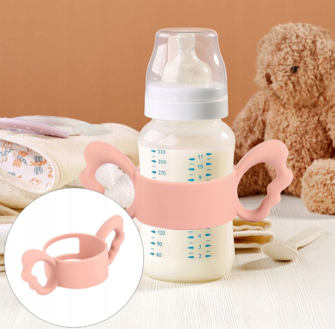Silikonowy uchwyt na butelkę dla dzieci różowy