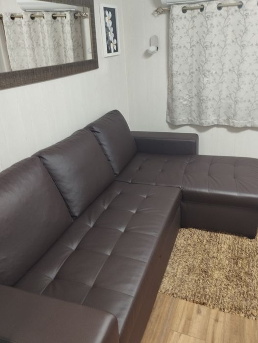 Sofá cama cheselong em pele como novo