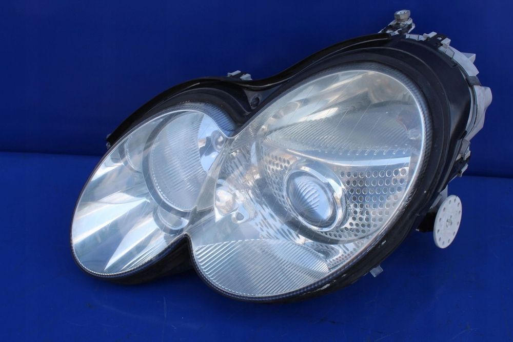 Reflektor lewy lampa lewa bi-xenon OE Mercedes SL R230 W230 SL500 Anglik