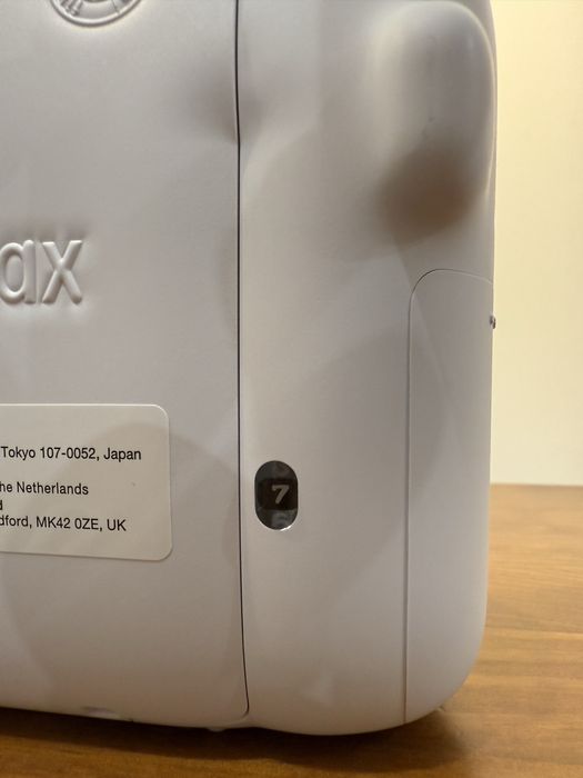 Instax mini 12 + bolsa + 7 recargas