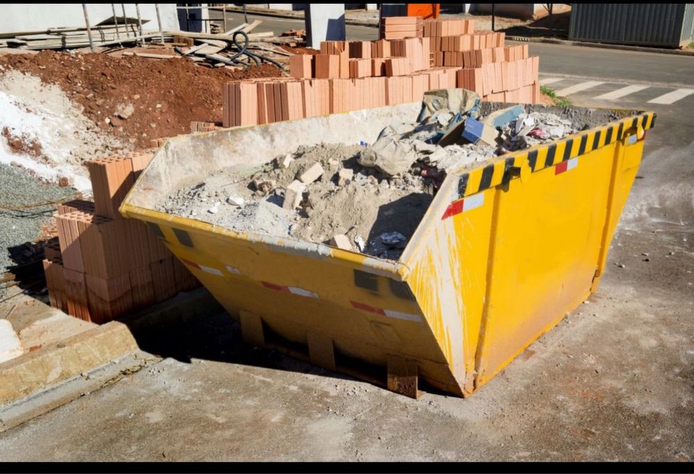 Usługa znoszenia śmieci po budowlanych z pięter  do kontenera