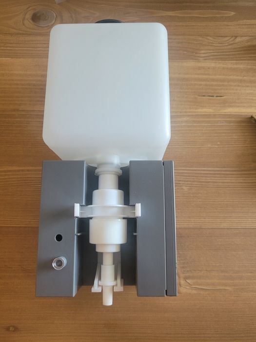 Dozownik automatyczny mechanizm