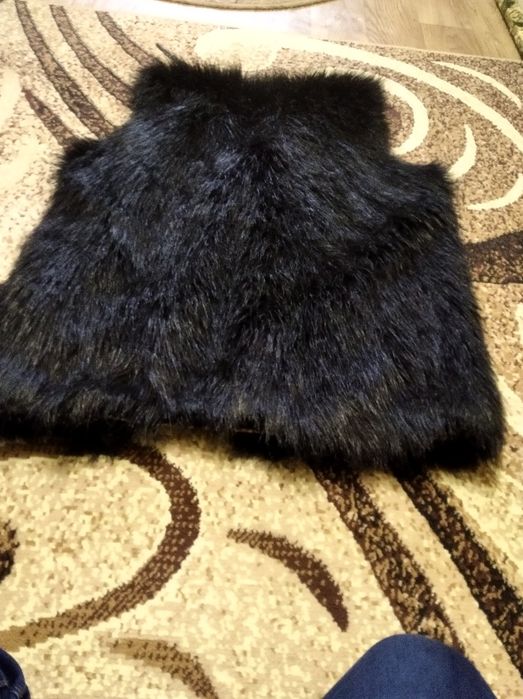 Меховая жилетка женская