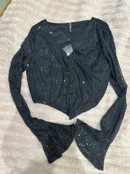 Чорна кофтинка в паєтки