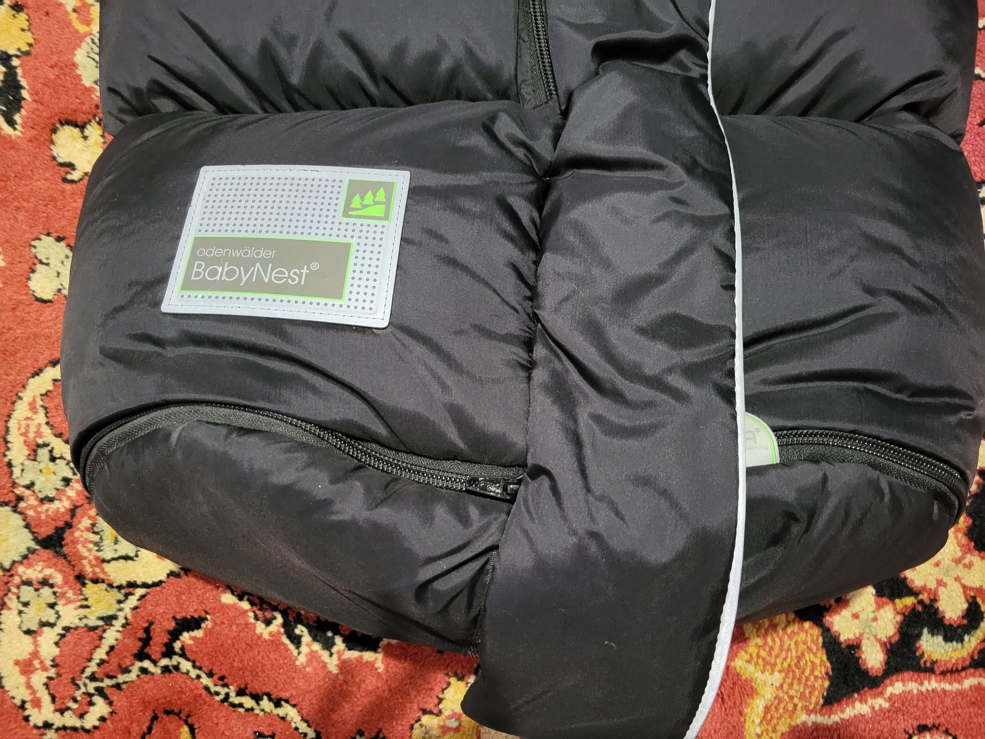 Продам новый зимний конверт в коляску Odenwalder BabyNest