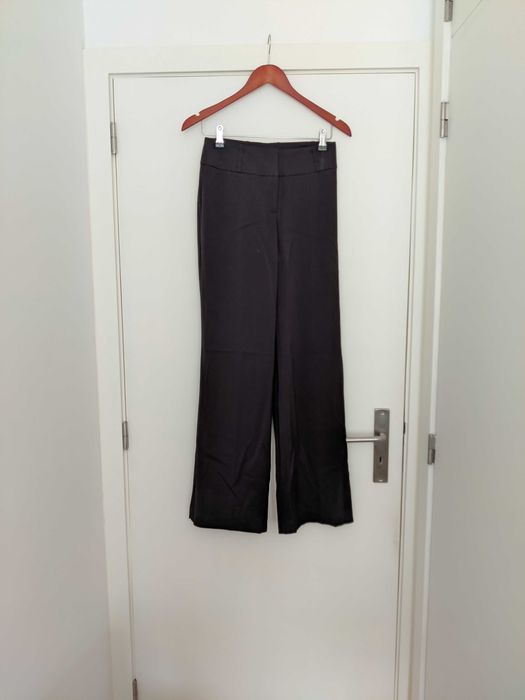 Calças H&M pretas boca de sino