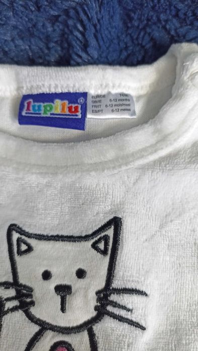 biała bluzeczka dziewczęca z długim rękawem