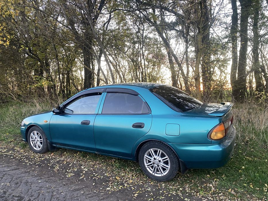 Мазда 323/ 1.5/акпп/1998