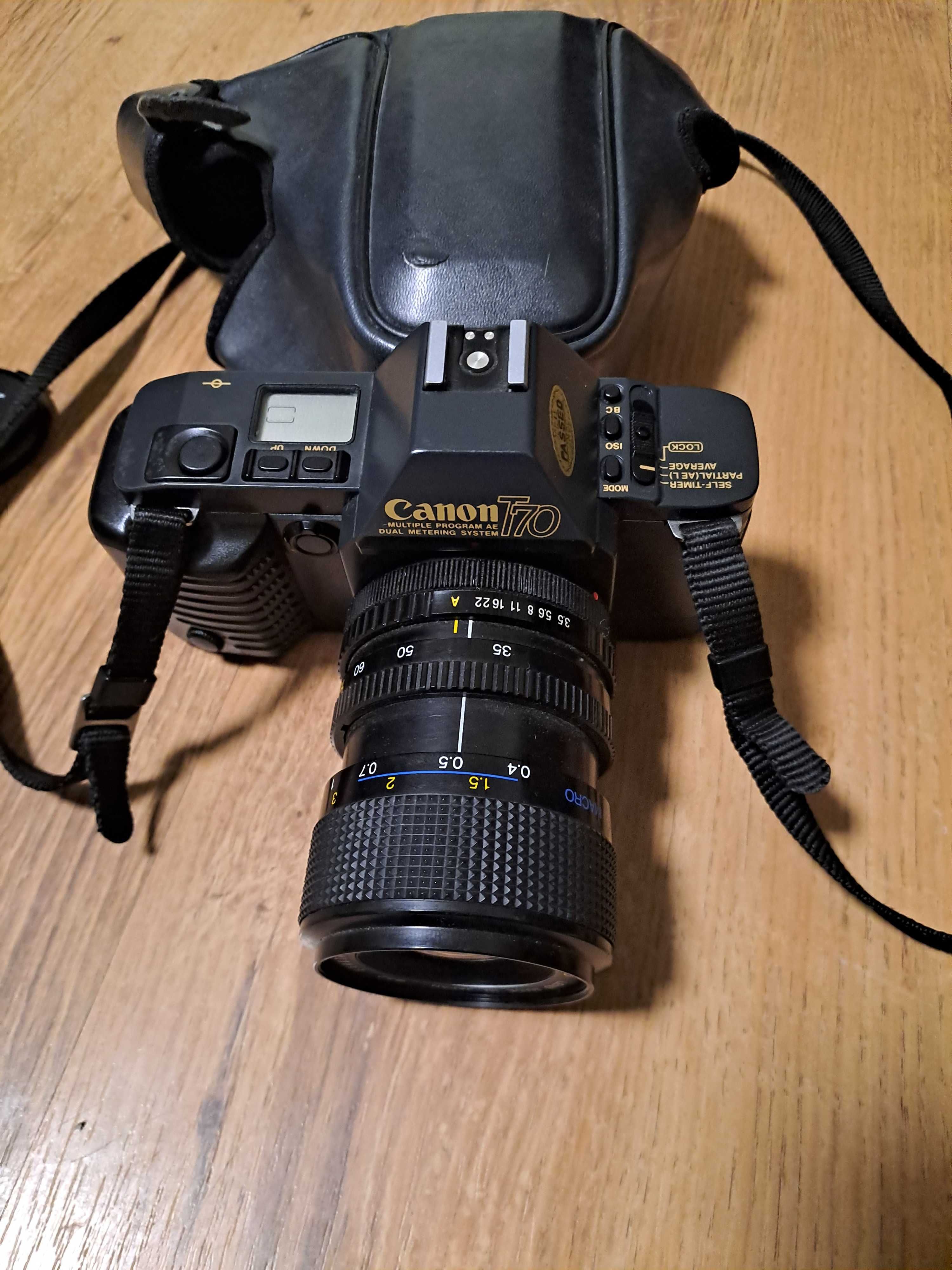 Canon T70.                      .