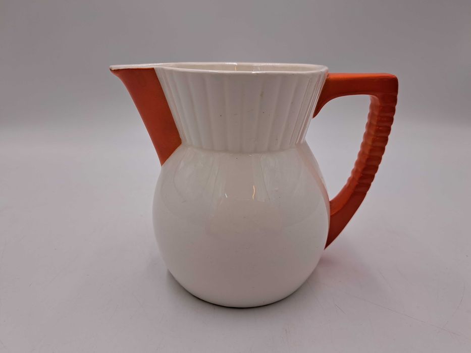 Stary dzbanek porcelana Max Roesler biały pomarańczowe ucho i dziubek
