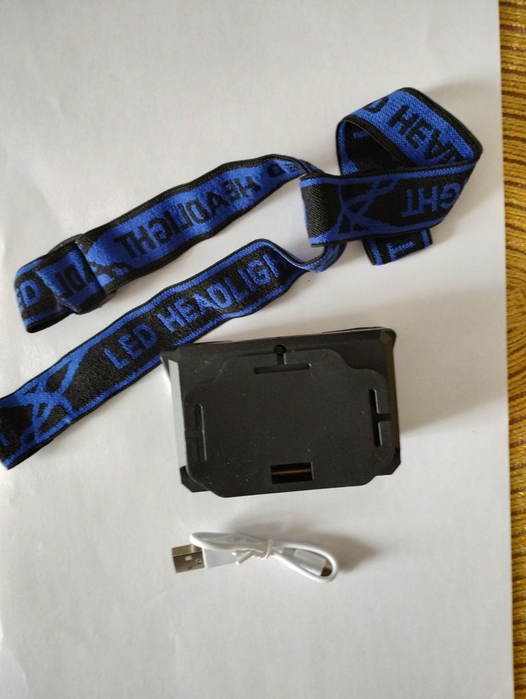 Latarka czołowa LED USB nowa