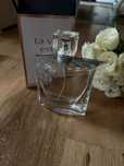 Flakon na perfumy Lancǒme z napełnieniem