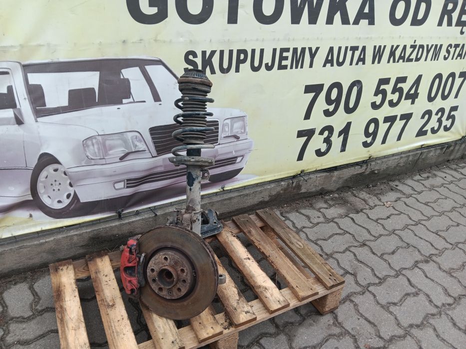 Opel Astra H III wahacz zwrotnica zacisk mcpherson lewy przód