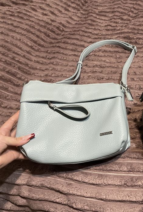 Жіночі сумочки..