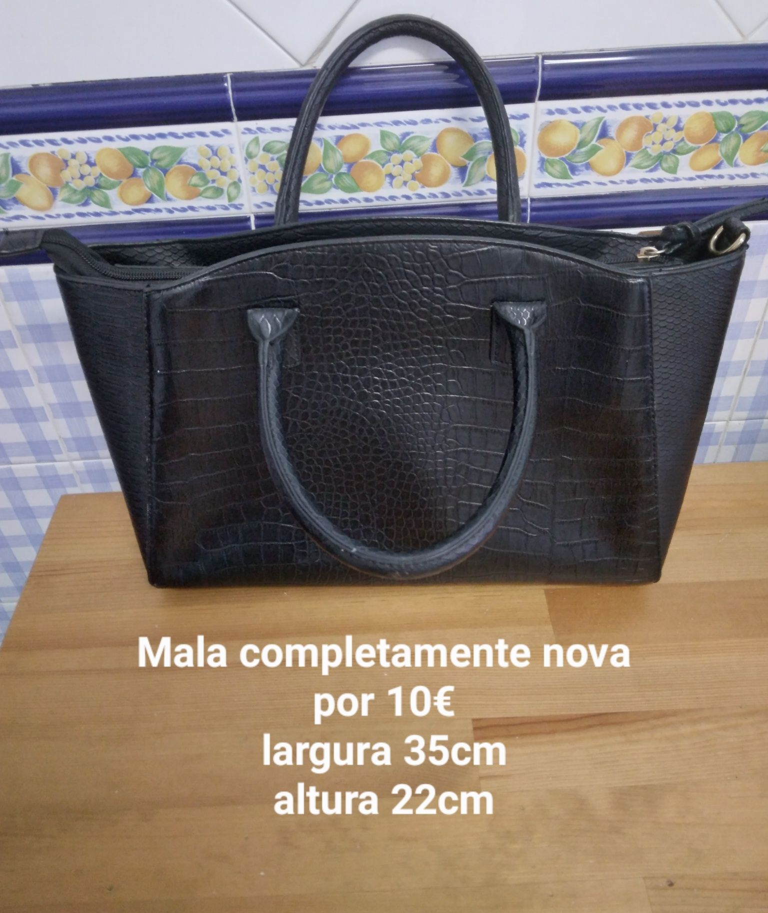Mala preta completamente nova