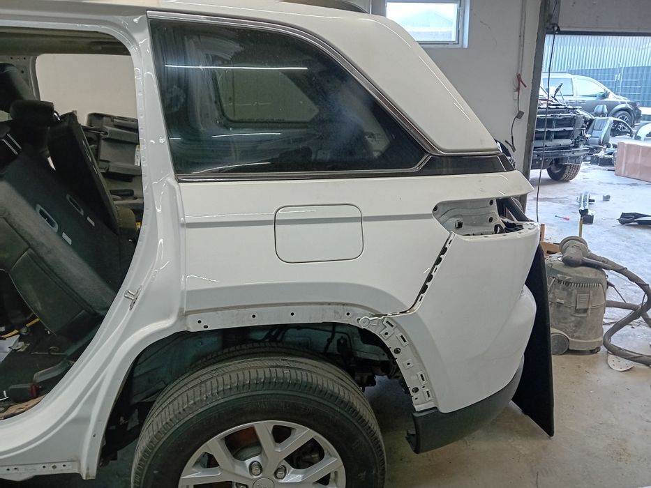 Blotnik cwiartka lewa jeep Grand cherokee wl krótki