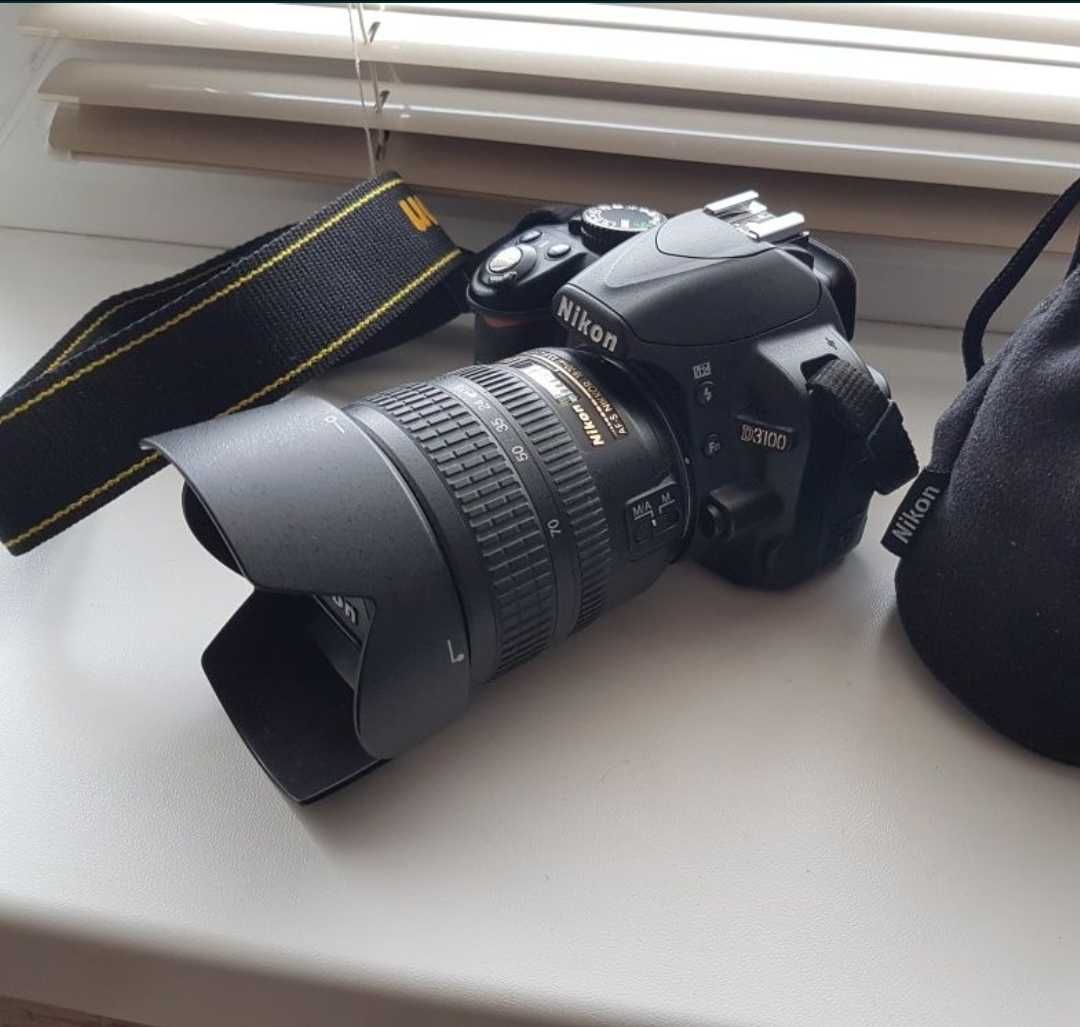 Nikon D3100 + 18-70mm