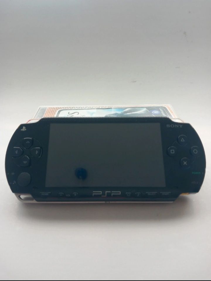 PSP + assasins creed+ Daxter