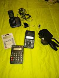 Maquina de etiquetar,calculadoras e telefone