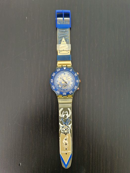 Relógio Swatch Aqua Chrono Olympic Special (SBZ102) NIKIPHOROS