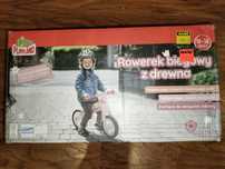 Nowy drewniany rowerek biegowy