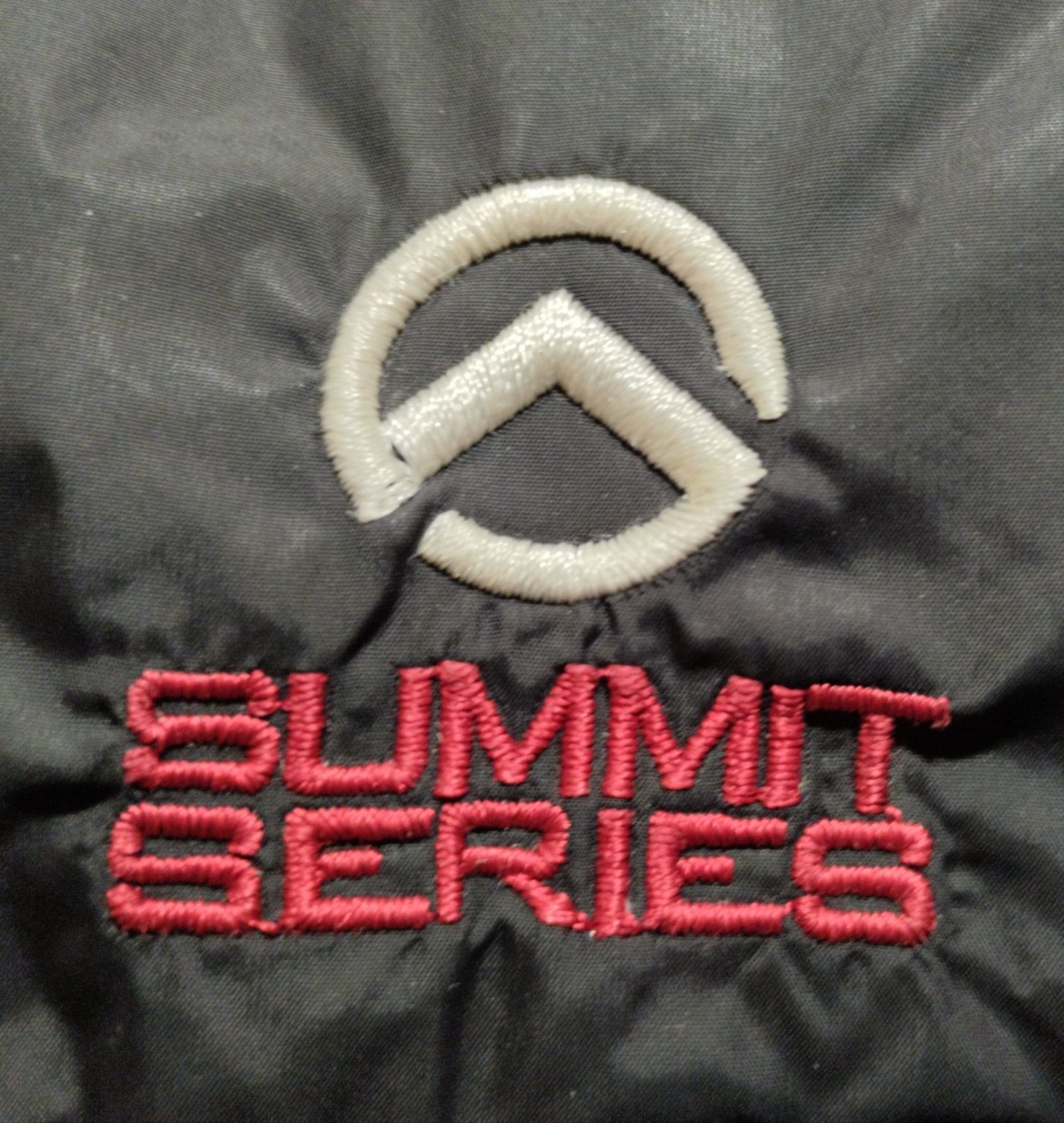 Пухова жилетка The North Face Summit Series розмір М