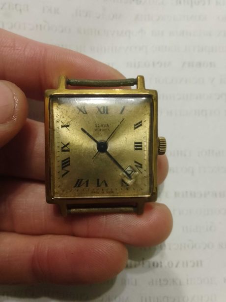 Советские позолоченные часы Слава с линзой