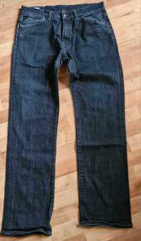 Lacoste spodnie jeansowe jeansy męskie bawełna F 42 UK 34
