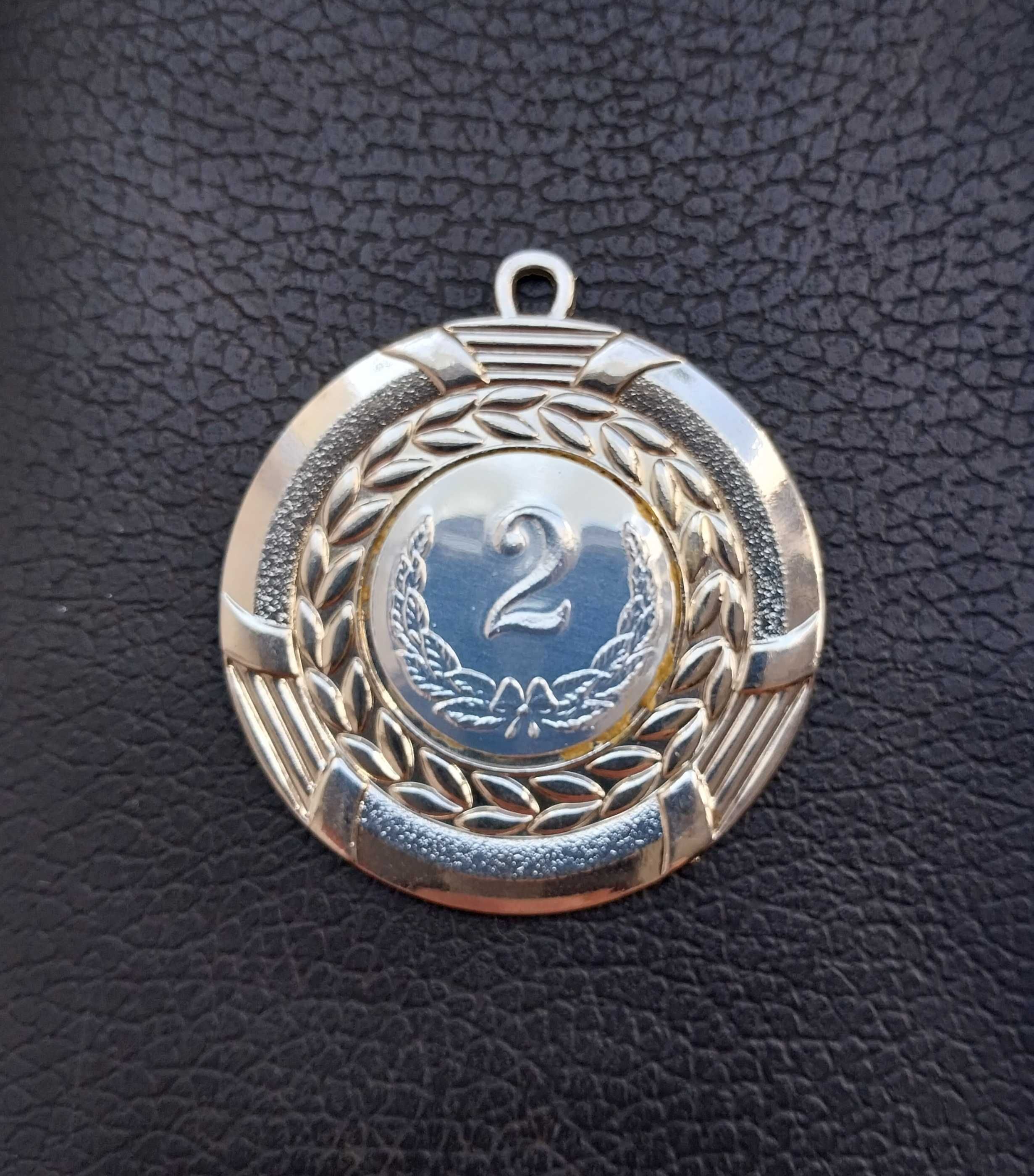 Медаль за 2-е место в соревнованиях