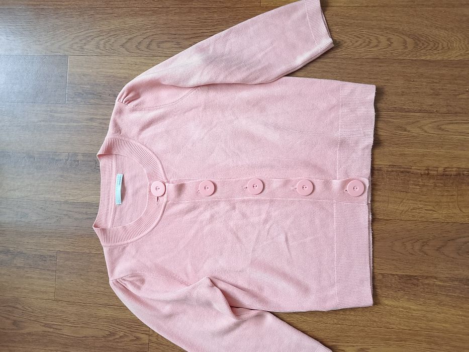 Sweter damski różowy.