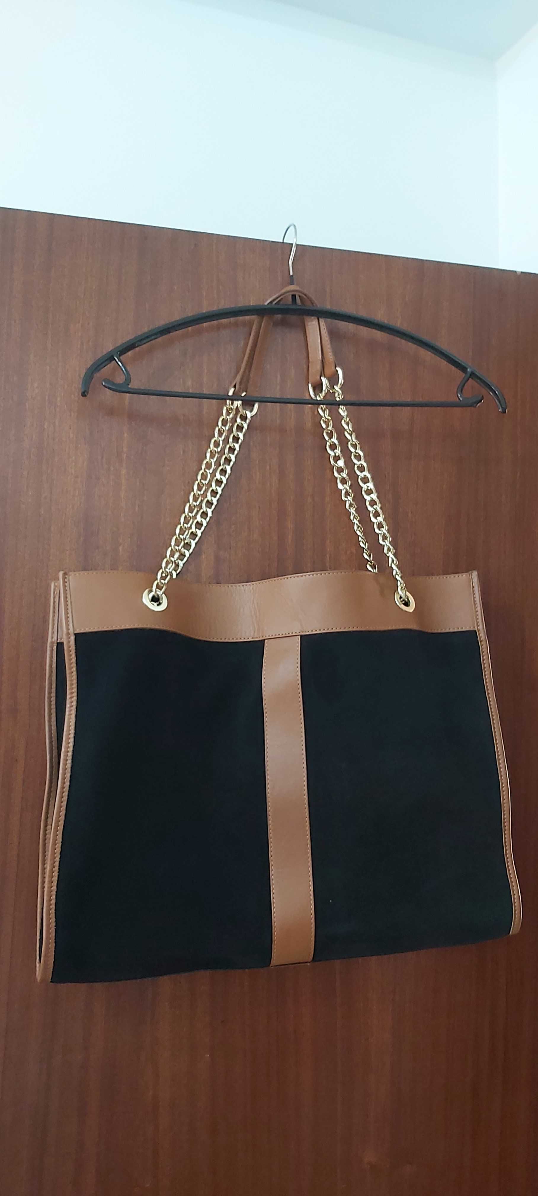 Mala shopper em pele genuína(preto e camel). Marca "Eureka"