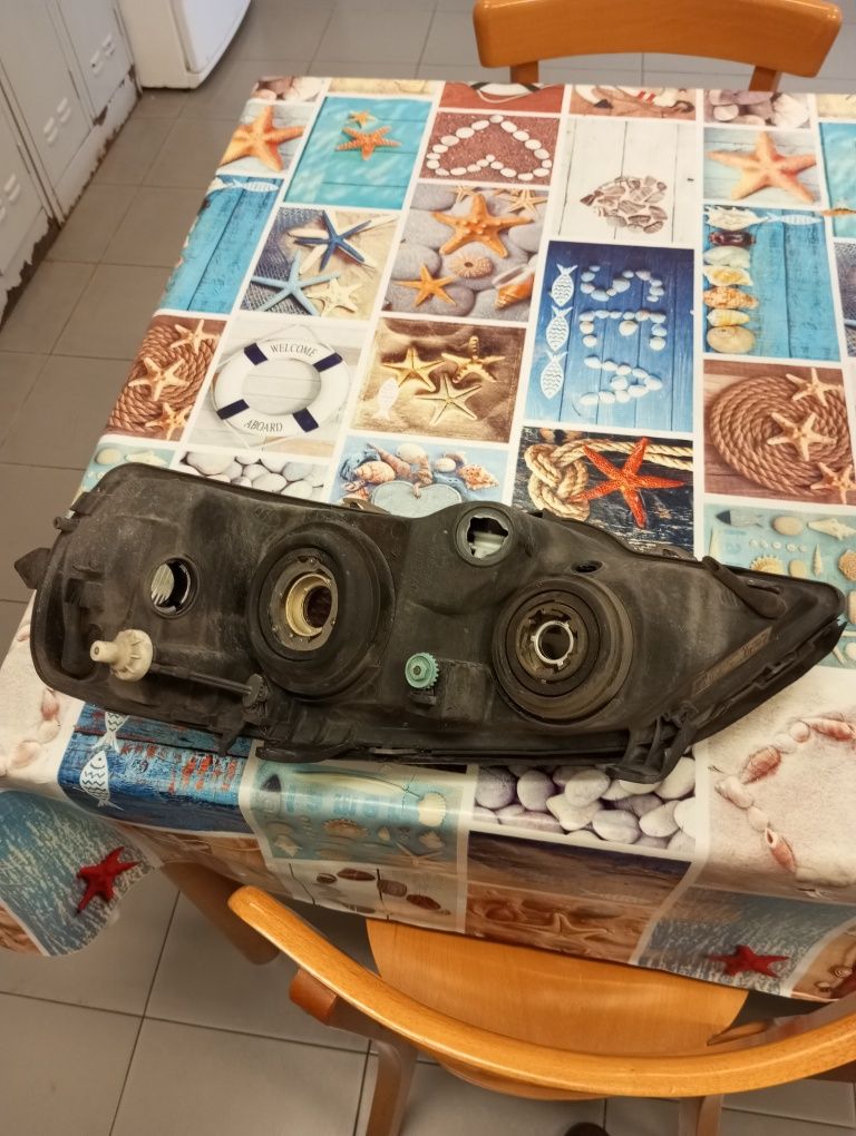 Faróis frontais Astra G com afinação eletrica